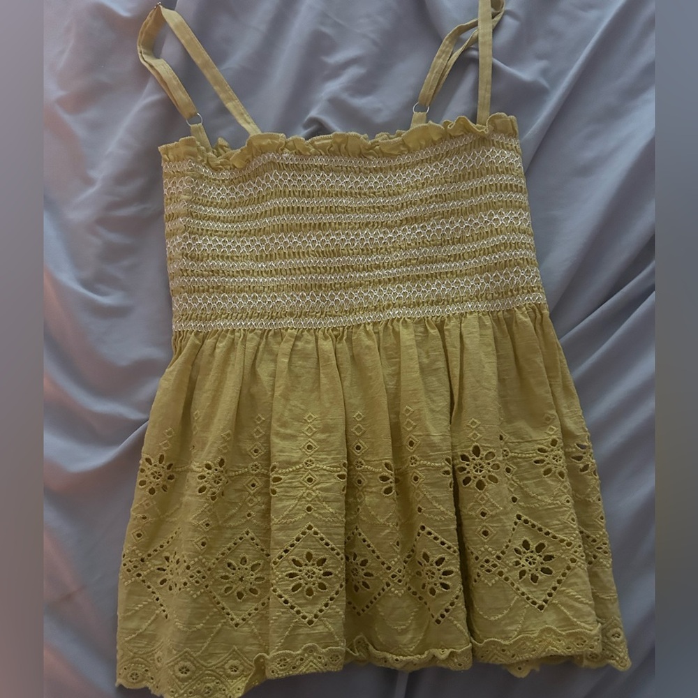 a cute summer top or spring that can be worn with jean shorts